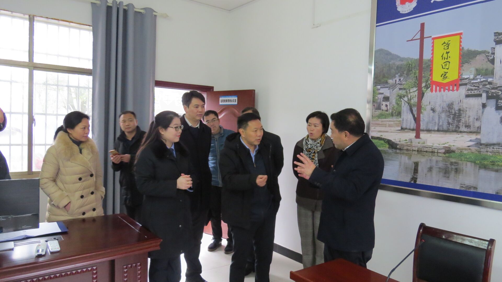 3月5日，宋骄阳同志（右一）向蒋星华（右三）书记一行介绍通山社矫工作的经验.jpg